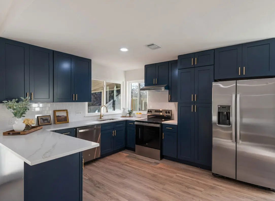 The same kitchen fully remodeled and staged, ready to sell