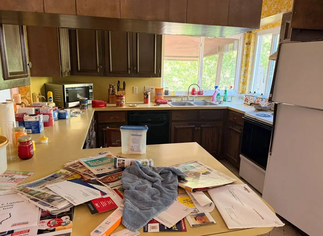 Cluttered inherited kitchen before The Probate Realtor's coordination