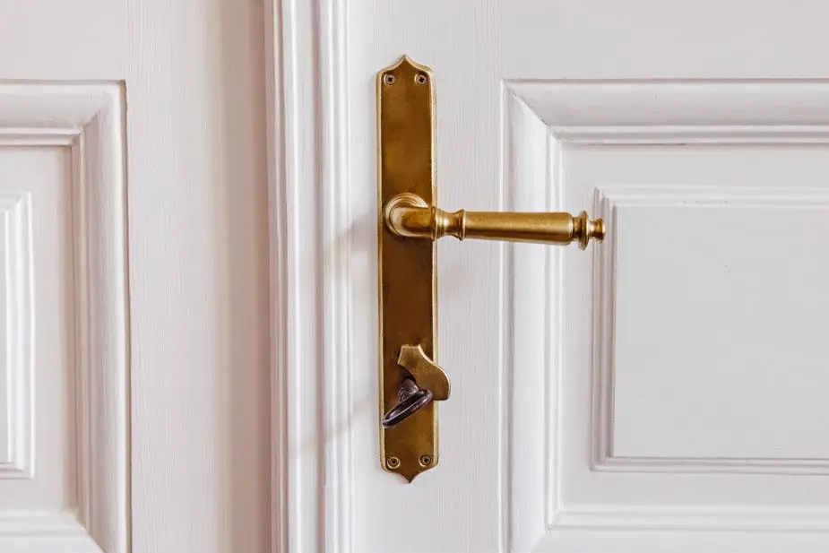 Elegant front door with a polished brass handle