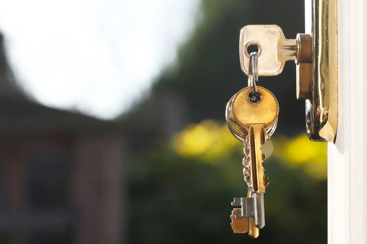 House keys being handed over at closing